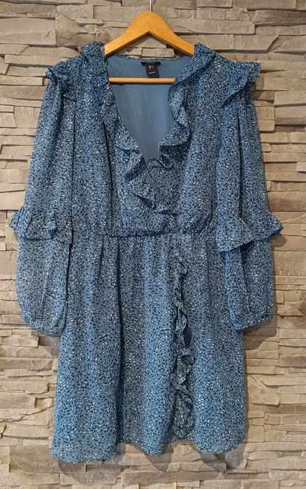 Krótka niebieska sukienka z długim rękawem falbanki lindex