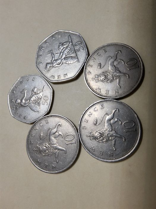 5 moedas new pence canadiano