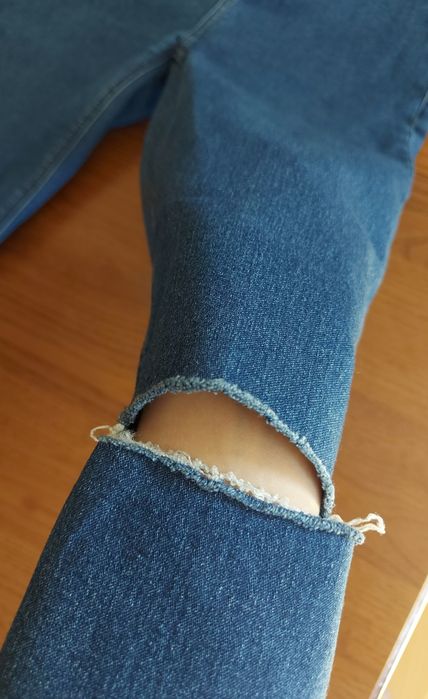 Jeansy z rozdarciami Sinsay Denim collection rozm. 36