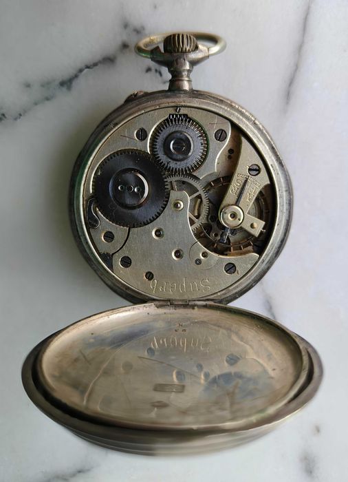 Relógio de bolso antigo em prata