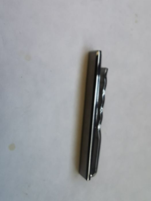 Заколка для галстука.