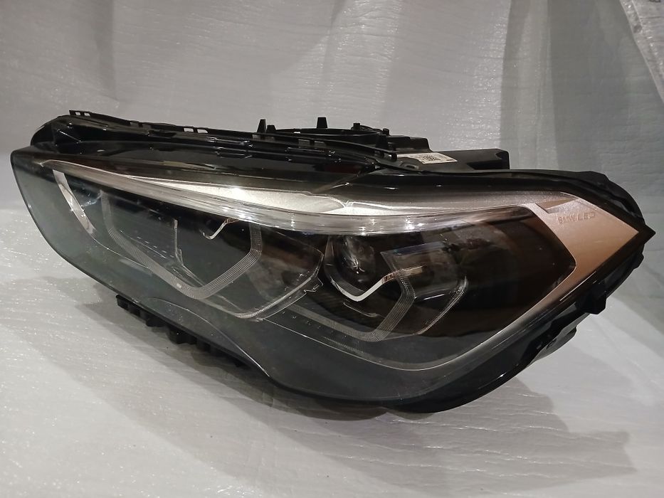 Фара ( ліва ) BMW