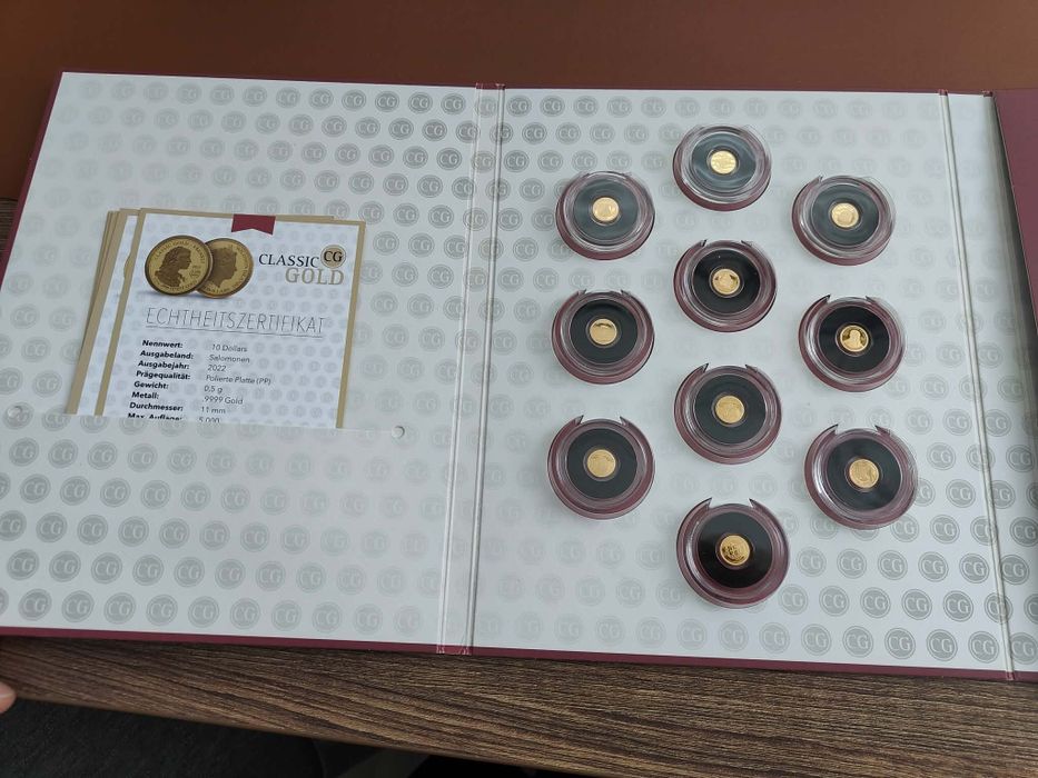 11 золотых монет с сертификатами + альбом