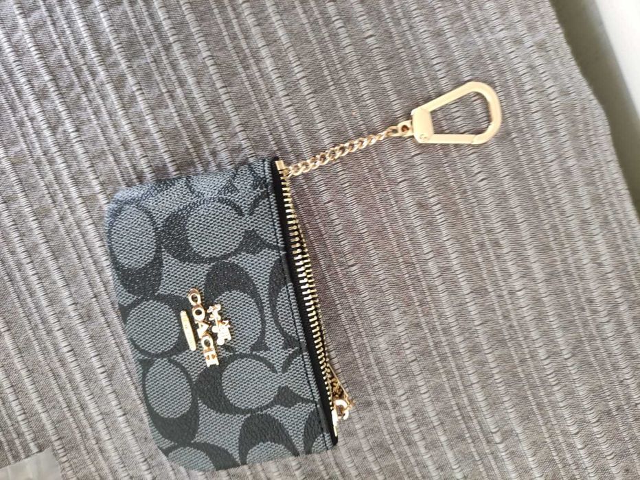 Porta moedas Coach