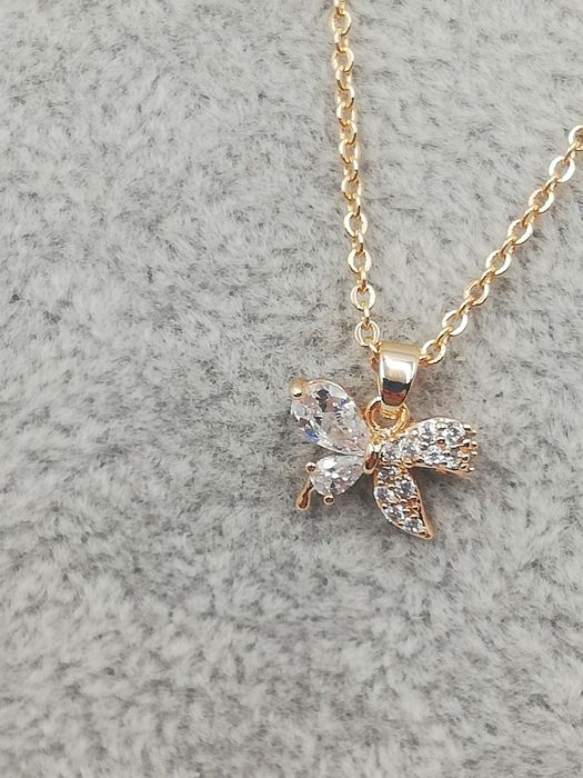 Celebrytka pozłacana 14 karatowym złotem Xuping cyrkoniowa kokardka