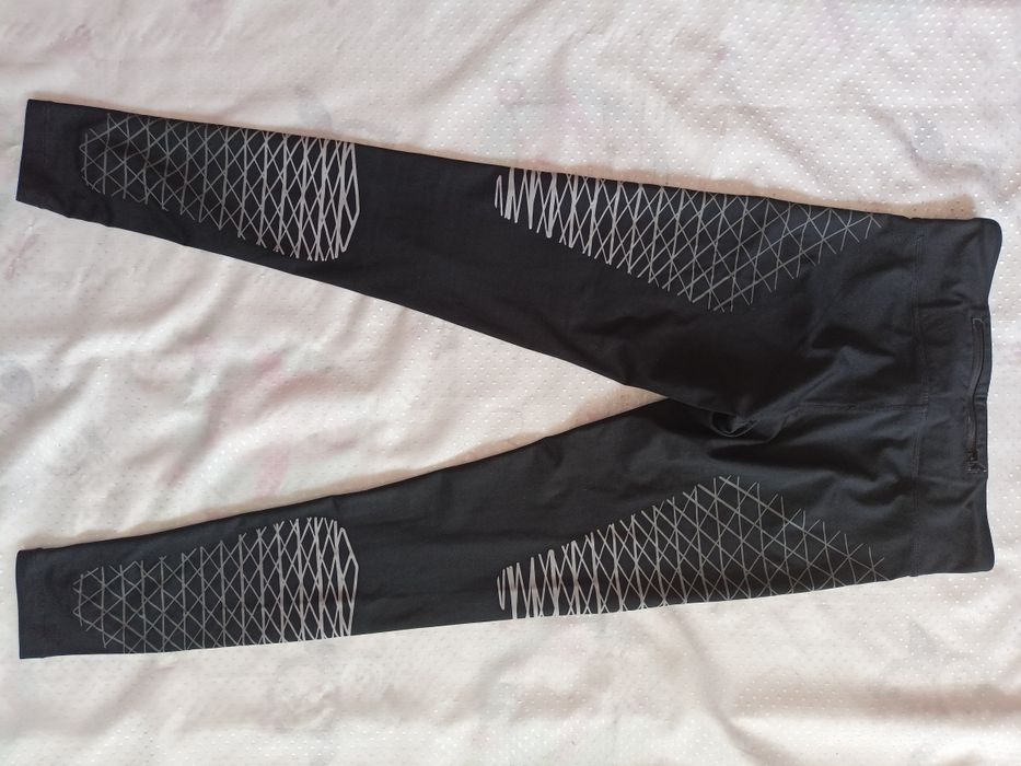 Nike spodnie sportowe  biegowe damskie