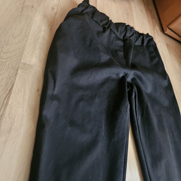 Spodnie czarne eleganckie,wysoki stan rozm.44. jak nowe.