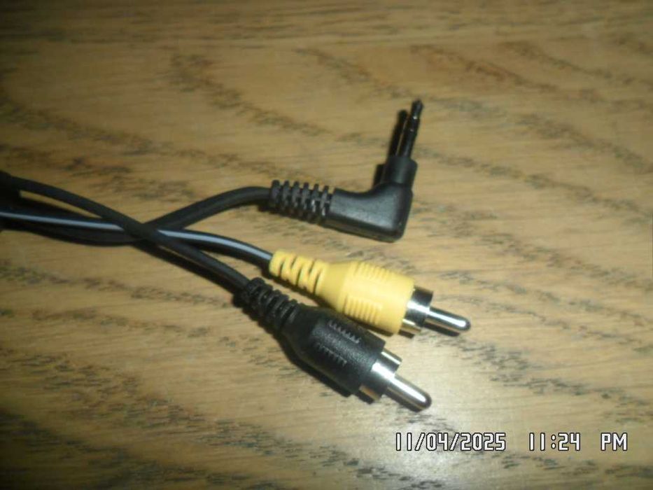 Canon: instrukcja (PowerShot SX100 IS) + kabel ( AVC-D300)