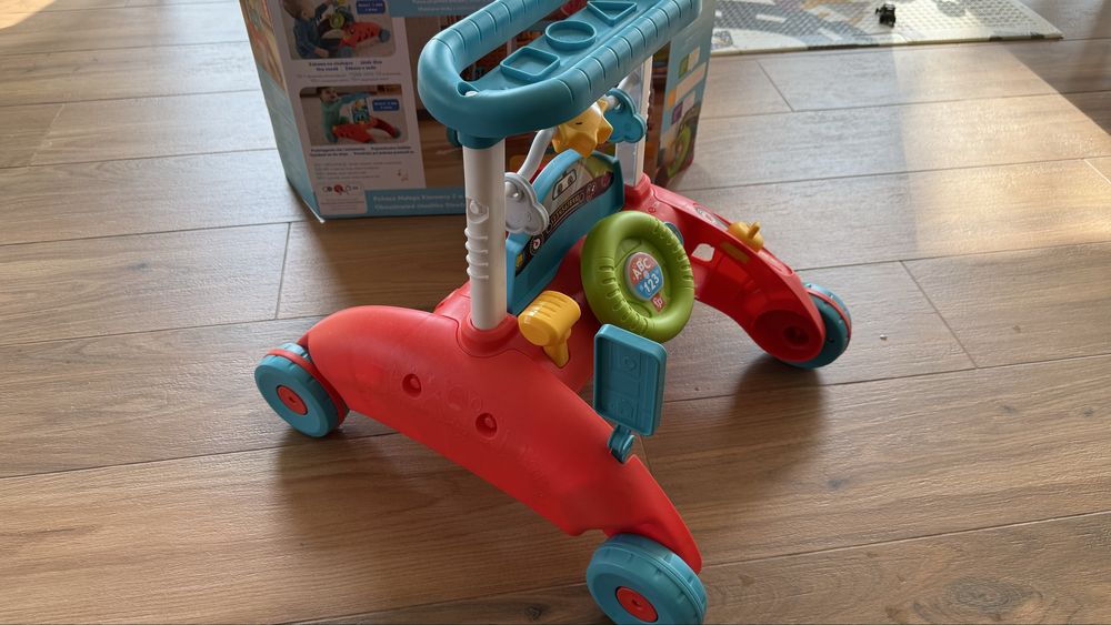 Interaktywny Chodzik pchacz Fisher Price