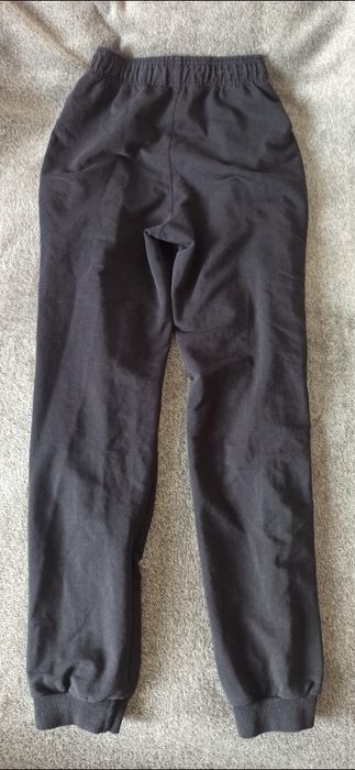 Czarne spodnie dresowe sportowe joggery unisex rozmiar S Puma