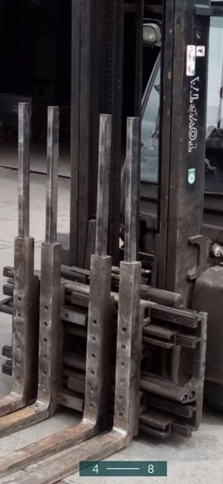 Pozycjonery KAUP chwytak ścisk CASCADE paletyzer wózek widłowy