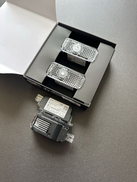 Подсветка дверей Audi LED Logo 4G0052133G оригинал, логотип Audi