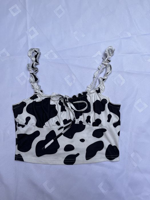 Top krowa łaciaty w łaty