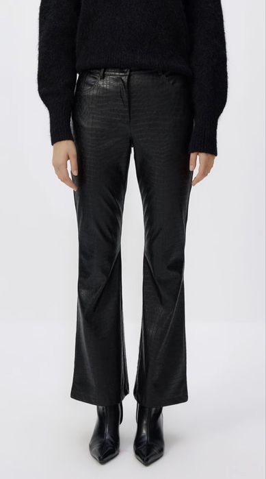 Штани -кльош зі штучної шкіри