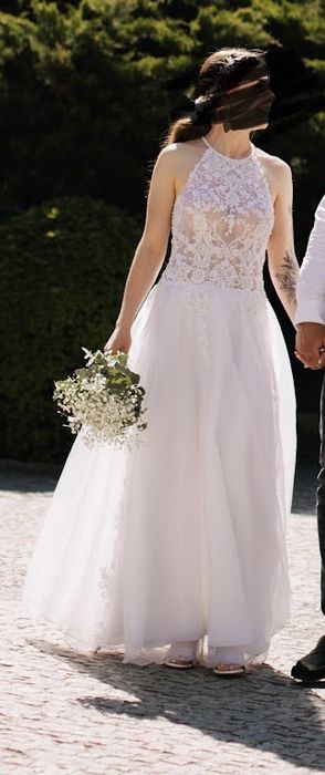 Ślubna sukienka dla niewysokiej kobiety