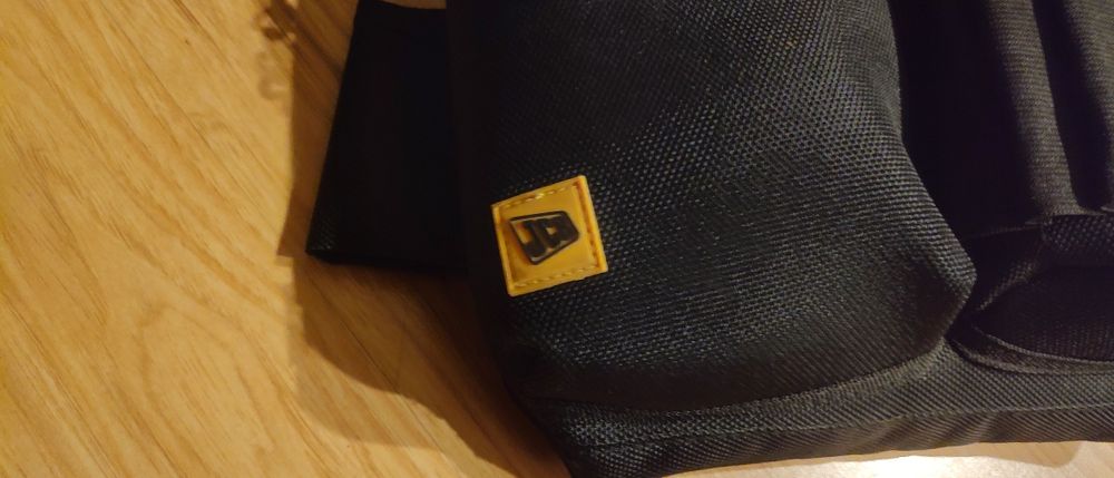 Pas narzędziowy JCB