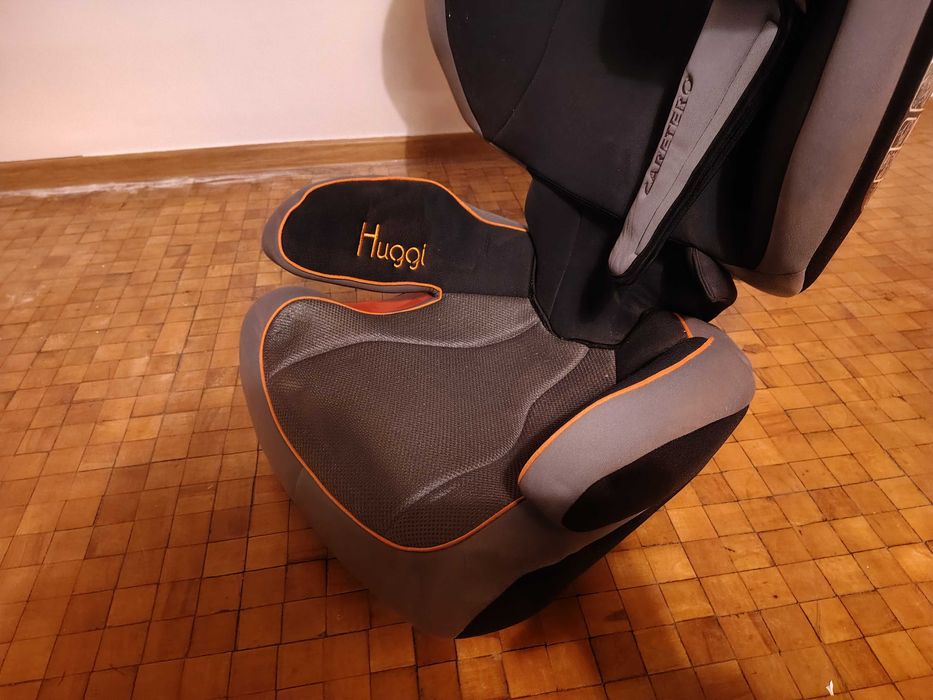 Fotelik dziecięcy samochodowy Caretero Huggi Nowy