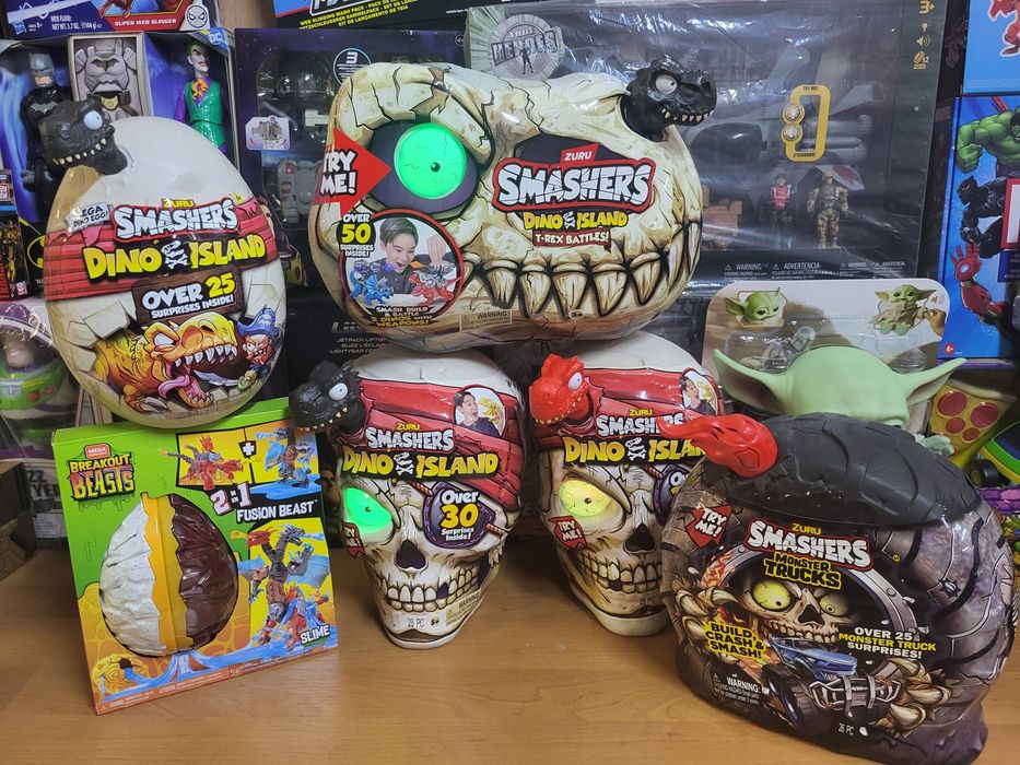 Динозавр Трекс в черепе с песком и 30 сюрпризов Smashers Dino Island