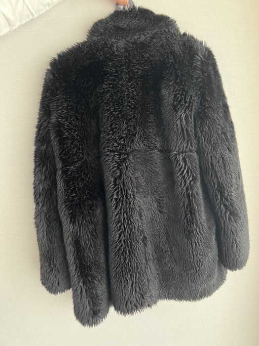 Casaco de pelo preto