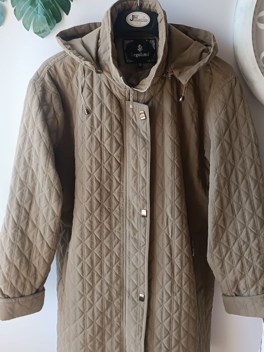 Стьобана куртка з капюшоном р 54 . Нова!