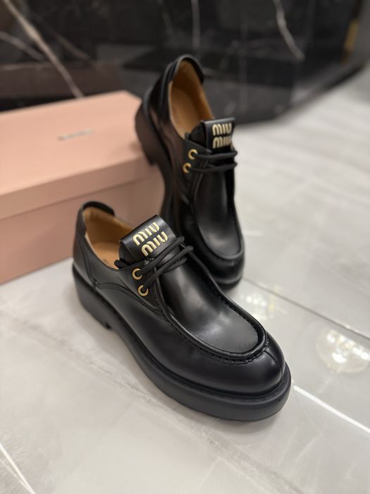 Połbuty Miu Miu black Leather