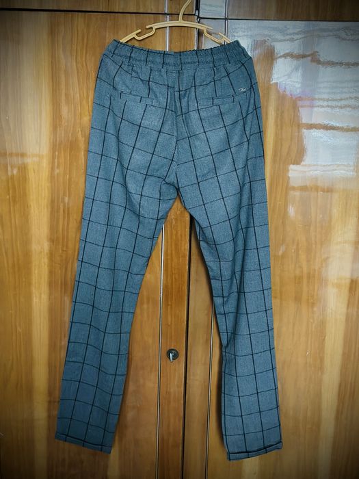 Штани чоловічі сірі в клітинку 164р.