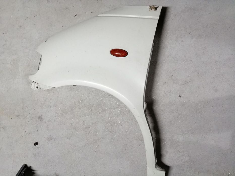 Guarda lamas esquerdo Nissan vanette 2.3d cargo