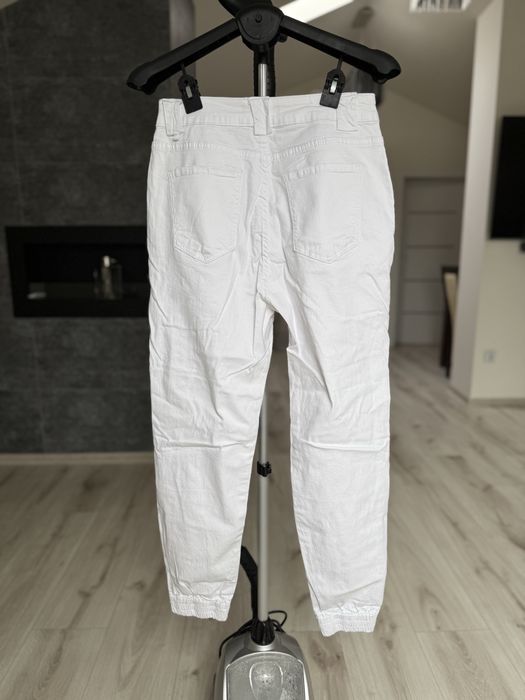 Jeansy spodnie cargo z przetarciami XL
