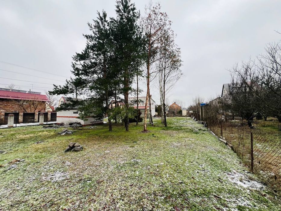 Продам участок в Обуховке,сосновый лес,река пляж закрытая территория