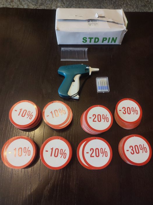 Pistola + etiquetas de promoção