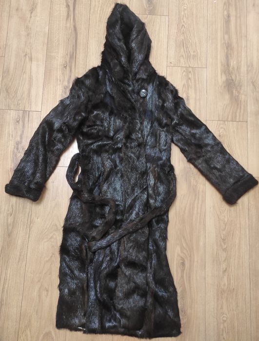 Шуба з нутріїї б/в потребує ремонту