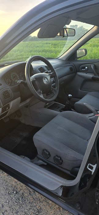 Mazda 323f 1.4 GPL