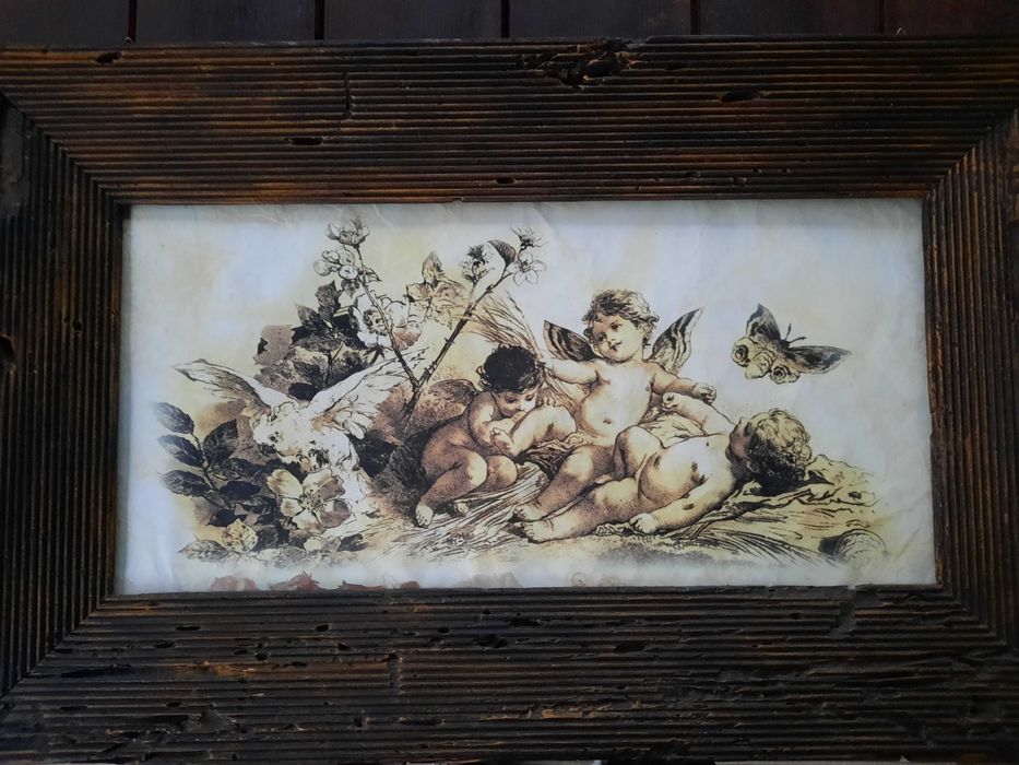 Obraz w ramce ze stuletnich bali