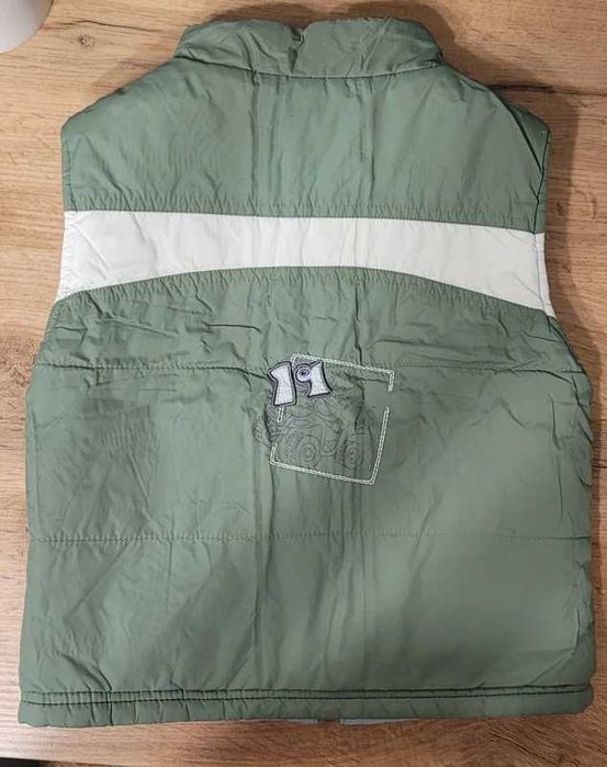 2 chłopięce kamizelki 74cm (na 9 miesięcy)- z dinozaurami i dwustronna