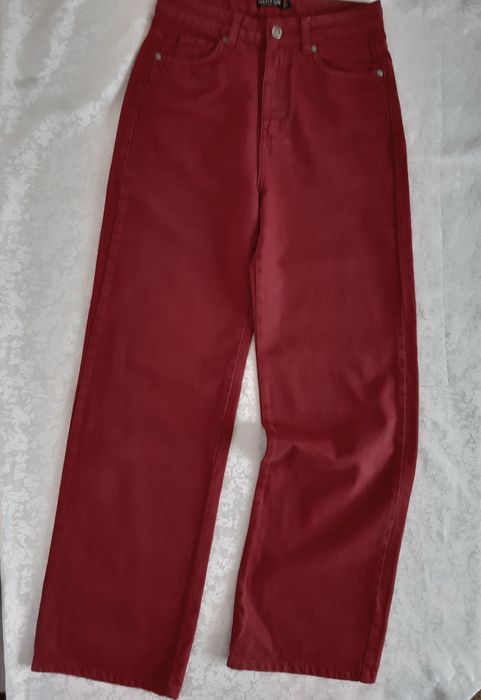 Джинси широкі червоні 42-44 р.