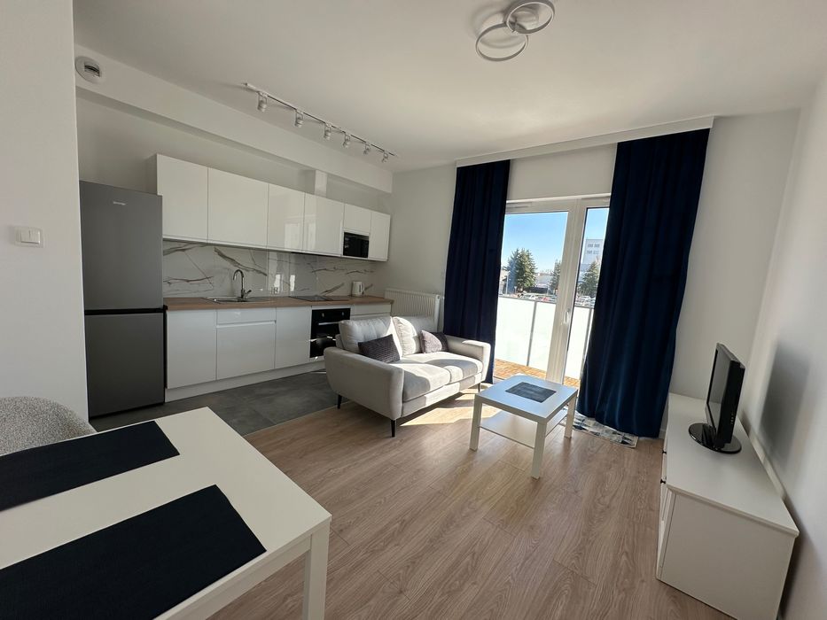 Nowoczesne 37 m2 mieszkanie + prywatne, zadaszone miejsce parkingowe na zamkniętym Osiedlu Qubik, ul. Powstańców Wielkopolskich 44