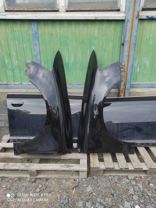 Audi A6 C6 lift błotnik prawy lewy LZ9Y