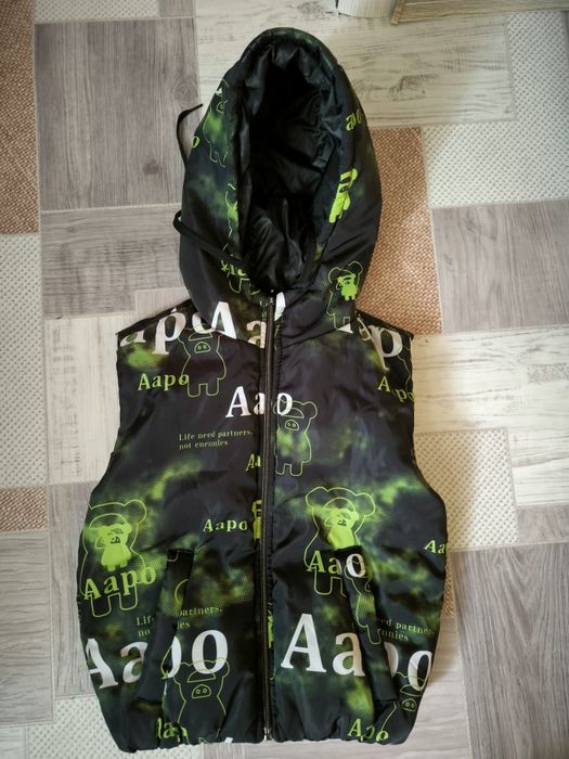 Продам жилетку на