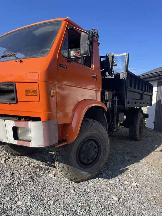 MAN 4x4 самоскид з маніпулятором