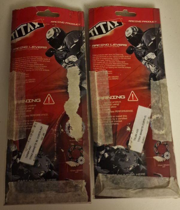 Manetes curtas Titax