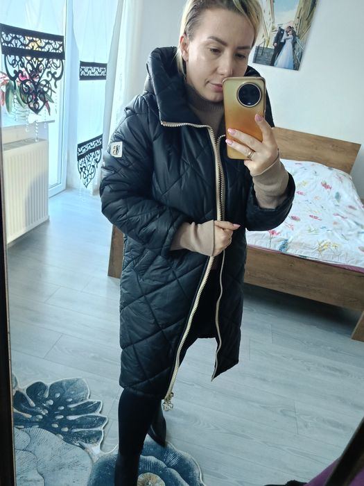 Długa kurtka zimowa z mankietami syntetycznymi