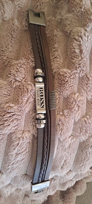 Pulseiras de homem em couro e aço