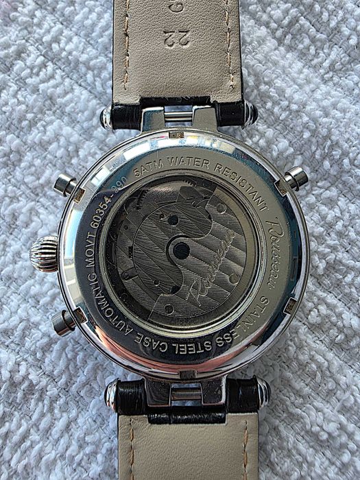 rousseau wristwatch day/date, month indicator, self-winding, water-resistant, gmt work great