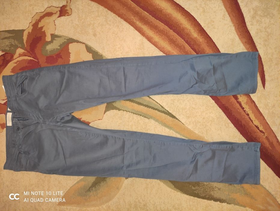 Męskie spodnie Reserved