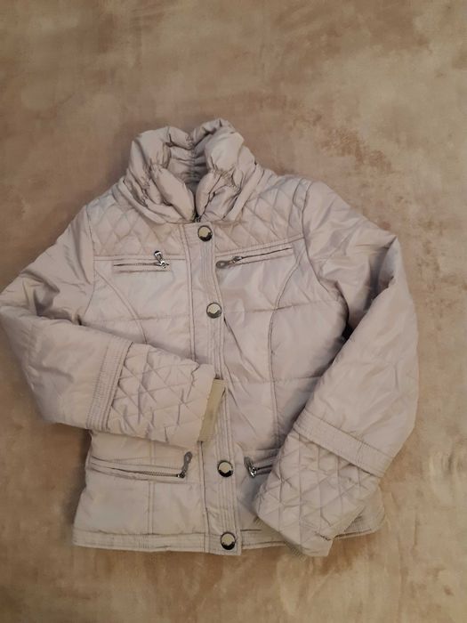 Beżowa kurtka zimowa z dopinką