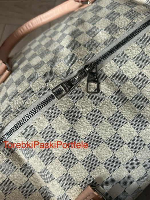 Nowa torba podróżna Louis Vuitton.