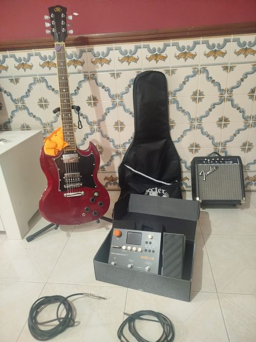 Guitarra com caixa e pedaleira