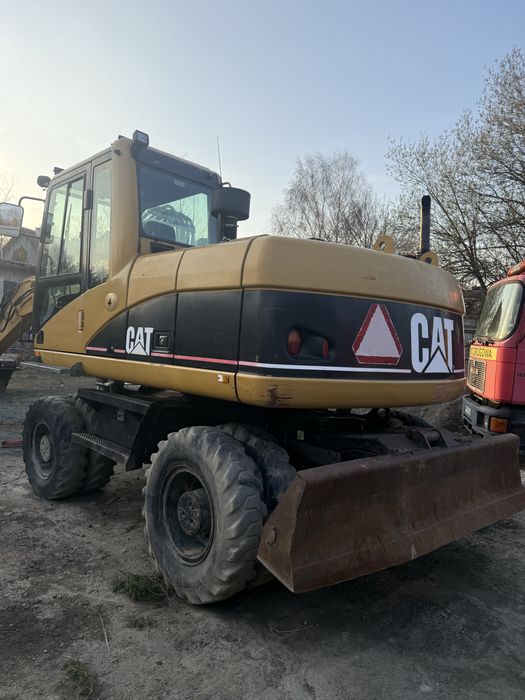 Koparka cat 313c Rototilt