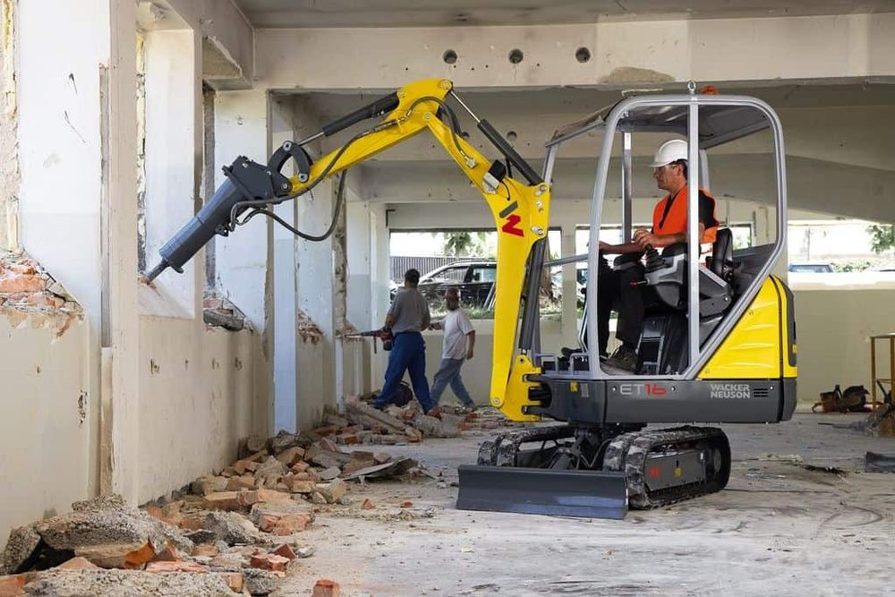 услуги гидромолота демонтаж бетона стен старых построек