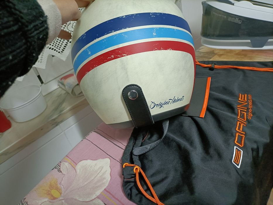 Capacete novo  E origine